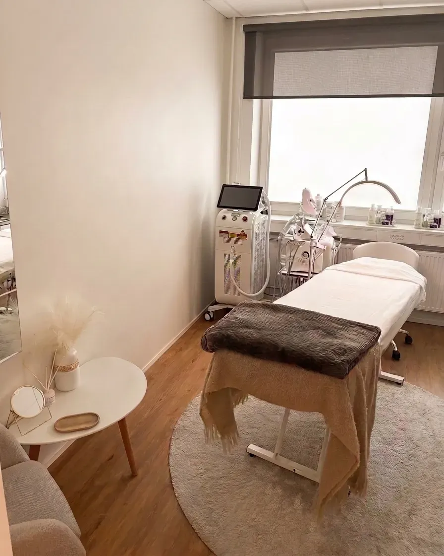 A warm, calm treatment room with natural light